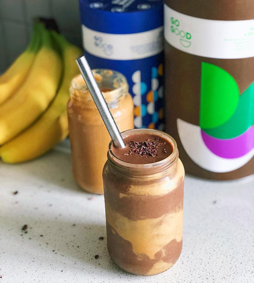 Chocolate and peanut butter smoothie in a jar.