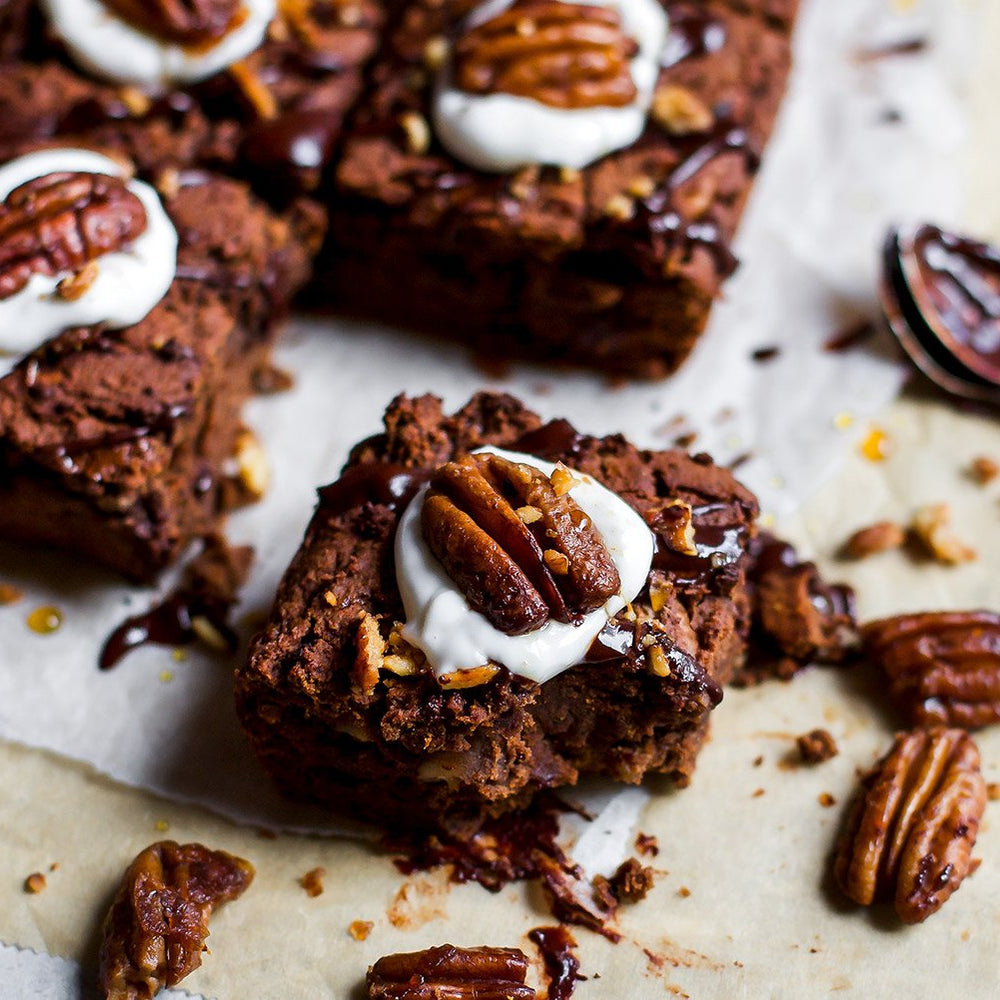 Protein-Packed Chocolate Date Brownie With Candied Maple Pecans.