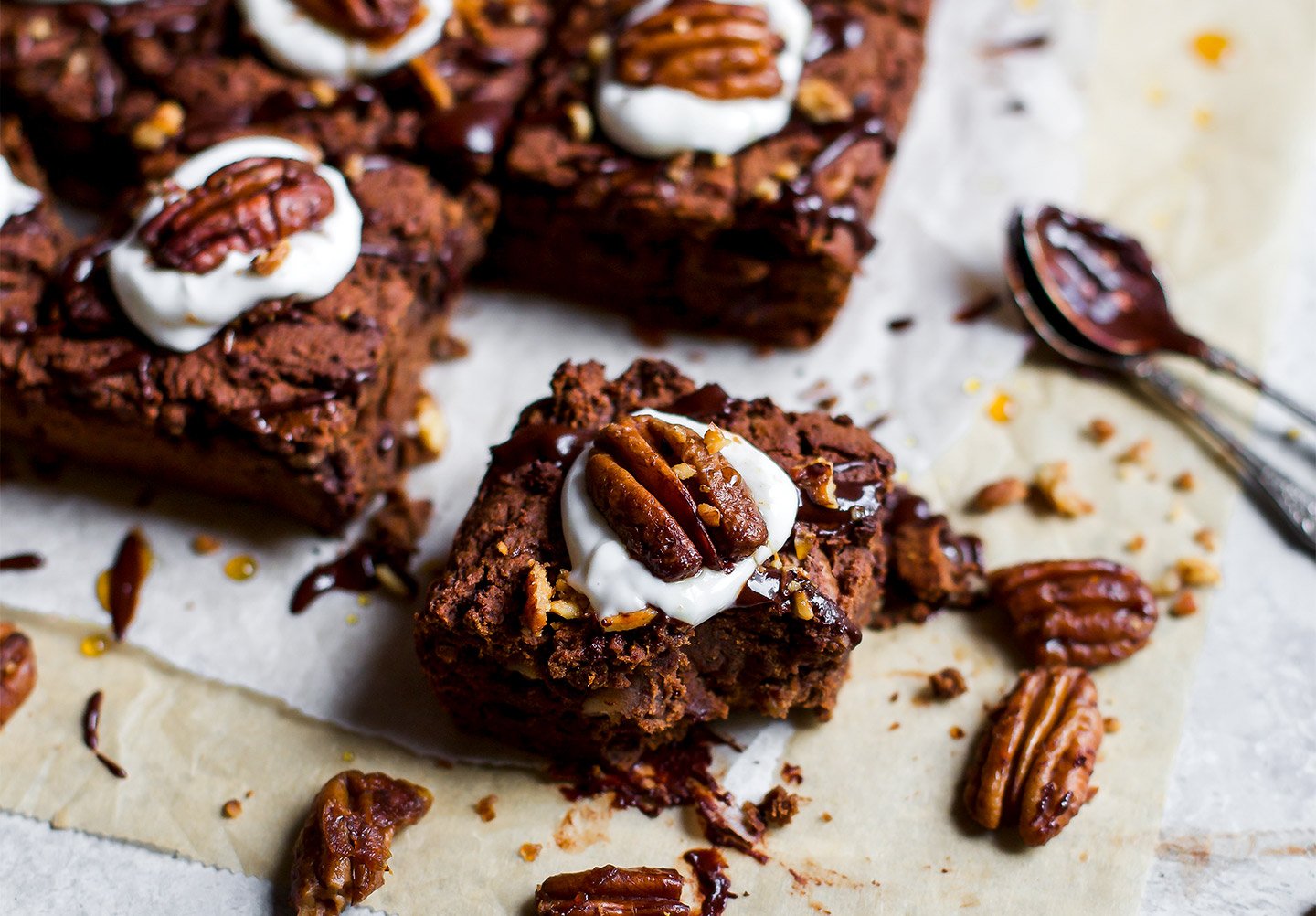 Protein-Packed Chocolate Date Brownie With Candied Maple Pecans.